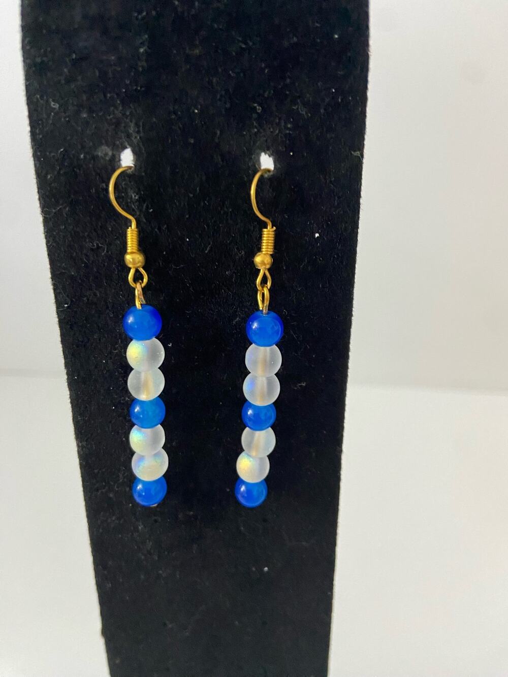 white and blue bead earrings